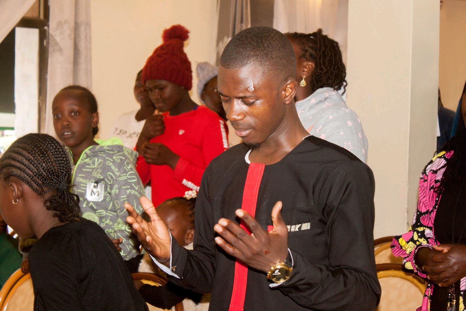 John Sele Philip praying