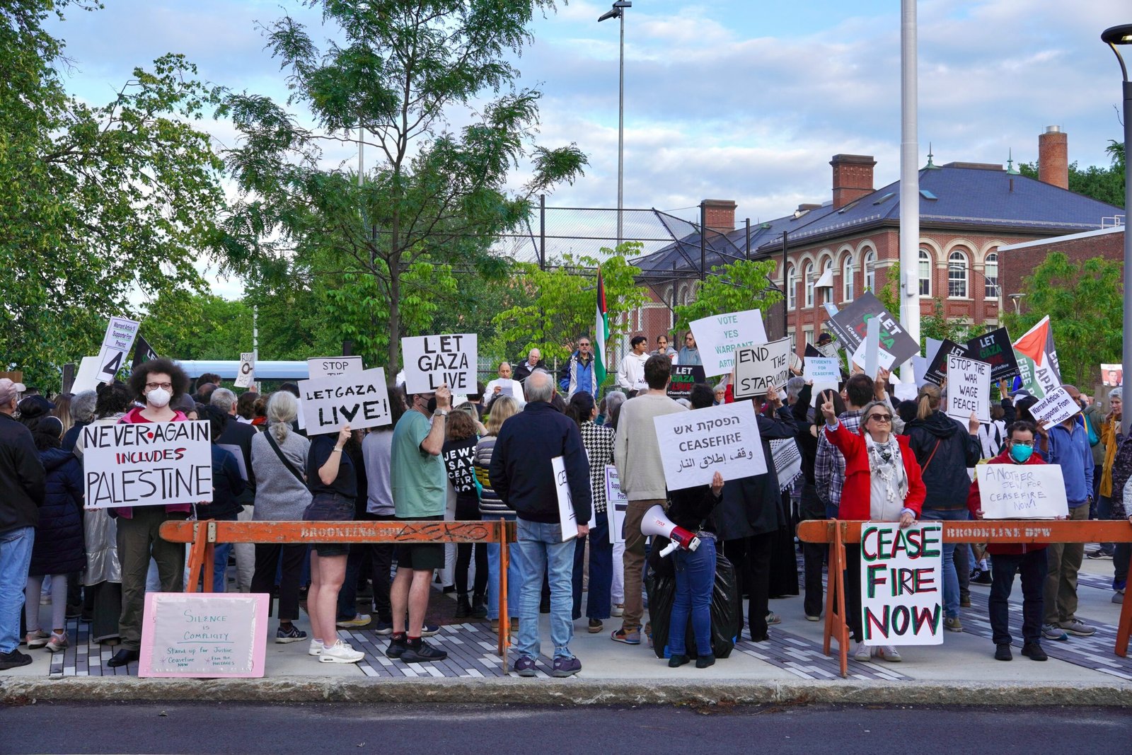 Protesters are holding signs, advocating for a cause.